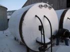 Used Tank, 3,000 gallon, Stainless steel, approximately 8' diameter x 9' straight side, dished heads, (Dairy). Carbon steel outer shell.  Oval manway and side entering approximately 1/2 hp agitator o...