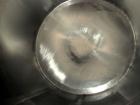 Used Tank, 3,000 gallon, Stainless steel, approximately 8' diameter x 9' straight side, dished heads, (Dairy). Carbon steel outer shell.  Oval manway and side entering approximately 1/2 hp agitator o...