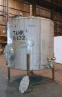 Used Tank, 1800 Gallon, 304 Stainless Steel, Vertical. Approximate 84” diameter x 72” straight side, coned top and bottom. (3) Turns of approximate 2” internal  pipe coil, no rating. (4) Sidewall baf...