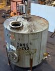 Used Tank, 1800 Gallon, 304 Stainless Steel, Vertical. Approximate 84” diameter x 72” straight side, coned top and bottom. (3) Turns of approximate 2” internal  pipe coil, no rating. (4) Sidewall baf...
