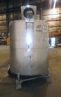 Used Tank, 1000 Gallons, 304 Stainless Steel, Vertical. Approximately 67