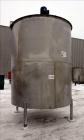 Used- Bright Sheet Metal Tank, Approximately 4,000 Gallon, 304 Stainless Steel, Vertical. 100