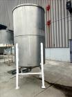 Used Tank, Approximate 1,000 Gallon, 304 Stainless Steel, Vertical. Approximate 56