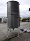 Used Tank, Approximate 1,000 Gallon, 304 Stainless Steel, Vertical. Approximate 56