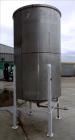 Used Tank, Approximate 1,000 Gallon, 304 Stainless Steel, Vertical. Approximate 56