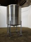 Used Tank, Approximate 1,000 Gallon, 304 Stainless Steel, Vertical.