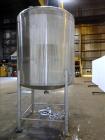 Used Tank, Approximate 1,000 Gallon, 304 Stainless Steel, Vertical.