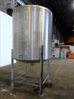 Used Tank, Approximate 1,000 Gallon, 304 Stainless Steel, Vertical.