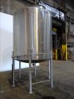 Used Tank, Approximate 2,000 Gallons, 304 Stainless Steel, Vertical.
