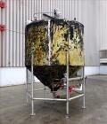 Used Tank, Approximately 1,700 Gallon, 304 Stainless Steel, Vertical.