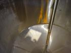 Used Tank, Approximately 1,700 Gallon, 304 Stainless Steel, Vertical.