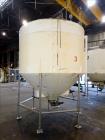 Used Tank, Approximately 1,700 Gallon, 304 Stainless Steel, Vertical.