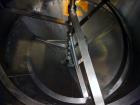 Used Tank, Approximately 1,700 Gallon, 304 Stainless Steel, Vertical.