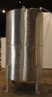 Used Tank, Approximately 1,000 gallon, 304 Stainless Steel, Vertical.