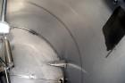 Used Tank, Approximate 2000 Gallon, Stainless Steel, Vertical.