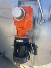 Used 3,200 gallon 316L Stainless Steel Single Wall Vertical Mix Tank.