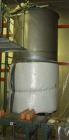 USED: 1100 gallon stainless steel tank, dimple jacketed, vertical,open top.