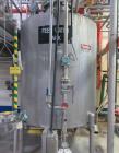 Used 1200 Gallon Stainless Steel Tank, Vertical. Approximate 66