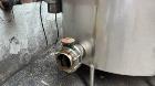 Used Tank, Approximate 1800 Gallon, Stainless Steel, Vertical. Approximate 84