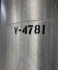 Used Approximate 4750 gallon Stainless Steel Agitated Tank With 5 HP Centrifugal Pump, V-4781. Top entering agitator (HP unknown). Cone bottom with center bottom outlet. Side bottom manway.