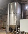 Used Approximate 4000 gallon Stainless Steel Storage Tank With 7.5 HP Centrifugal Pump, V-4782.  Misc. top inlets. Cone bottom with center bottom outlet. Bottom side manway. With 7.5 HP stainless ste...