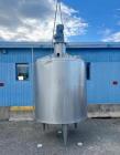 1720 Gallon Jacketed, 316 Stainless Steel Tank with 10HP Mixer.