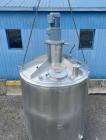 1720 Gallon Jacketed, 316 Stainless Steel Tank with 10HP Mixer.