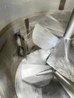 1720 Gallon Jacketed, 316 Stainless Steel Tank with 10HP Mixer.