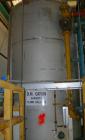 USED: Approximate 3750 gallon stainless steel storage tank. Vertical, dished heads. Approximately 7' diameter x 12' straight side. Mounted on 4 I-beam stainless steel legs. 6