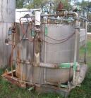 USED: Approximate 1000 gallon stainless steel tank. Approximately 6' diameter x 5' straight side. Flat top and bottom, insulated..