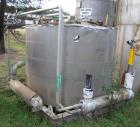 USED: Approximate 1000 gallon stainless steel tank. Approximately 6' diameter x 5' straight side. Flat top and bottom, insulated..