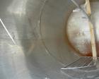 USED:  Approx. 1400 gallon tank, 316 stainless steel, vertical.  60