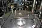 Used APV Crepaco Tank, 1500 Gallon, 304 Stainless Steel, Vertical. Approximate 84