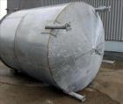 Used- Approximately 4,000 Gallon Bright Sheet Metal Tank.