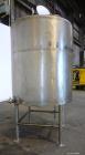 Used C.E. Howard Tank, 1000 Gallon, 304 Stainless Steel, Vertical. 66