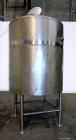 Used C.E. Howard Tank, 1000 Gallon, 304 Stainless Steel, Vertical. 66