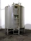 Used Cherry Burrell Tank, 2000 Gallon, 304 Stainless Steel, Vertical. 84” Diameter x 81” straight side, dished top, sloped bottom. (1) Spray ball, external side ladder. Openings: top (2) 2”, 3”, 3