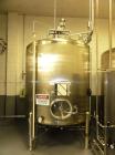 Used Cherry Burrell 2,000 Gallon Top Agitated Mixing Tank, Model CV.  304 Stainless steel mixing tank with (4) stainless steel legs.  Approximately 7' diameter x 6'6
