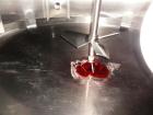 Used Cherry Burrell 2,000 Gallon Top Agitated Mixing Tank, Model CV.  304 Stainless steel mixing tank with (4) stainless steel legs.  Approximately 7' diameter x 6'6