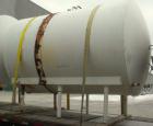 Used Cherry Burrell Storage Tank, 3000 gallon, 304 stainless steel, horizontal. 84'' diameter x 108'' straight side, dished heads. Insulated with carbon steel sheathing. 1/4 channel jacket on partial...