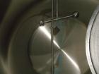 Used Cherry Burrell Storage Tank, 3000 gallon, 304 stainless steel, horizontal. 84'' diameter x 108'' straight side, dished heads. Insulated with carbon steel sheathing. 1/4 Channel jacket on partial...