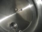 Used Cherry Burrell Stainless Steel Tank with  5 hp side agitator, 8' straight wall, 9' diameter, 15' overall length, domed top/bottom, (6) stainless steel legs, top and front manways, center bottom ...
