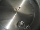 Used Cherry Burrell Stainless Steel Tank with  5 hp side agitator, 8' straight wall, 9' diameter, 15' overall length, domed top/bottom, (6) stainless steel legs, top and front manways, center bottom ...