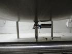 Used Cherry Burrell Stainless Steel Tank with  5 hp side agitator, 8' straight wall, 9' diameter, 15' overall length, domed top/bottom, (6) stainless steel legs, top and front manways, center bottom ...
