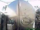Unused-Used 3000 gallon stainless steel tank. Manufactured by Cherry Burrell. Approximately 87 inches in diameter X 117” long. Sanitary finish. Includes spray ball and side entering agitator. Lst use...