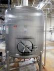 Used Cherry Burrell 1,000 Gallon Stainless Steel Tank, Vertical. Approximate 60