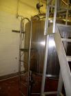 Used Creamery Package Tank, 1000 Gallon, stainless steel, vertical. 72