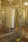 Used 1000 Gallon Stainless Steel Single Wall Tank