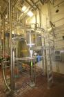 Used 1000 Gallon Stainless Steel Single Wall Tank