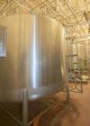 Used- DCI 2,000 Gallon Stainless Steel Single Wall Mix Tank, Vertical. Dome Top/Cone Bottom. Top mounted agitation with bott...